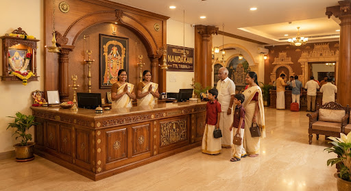 Reception lobby area at Nandakam Rest House in Tirumala